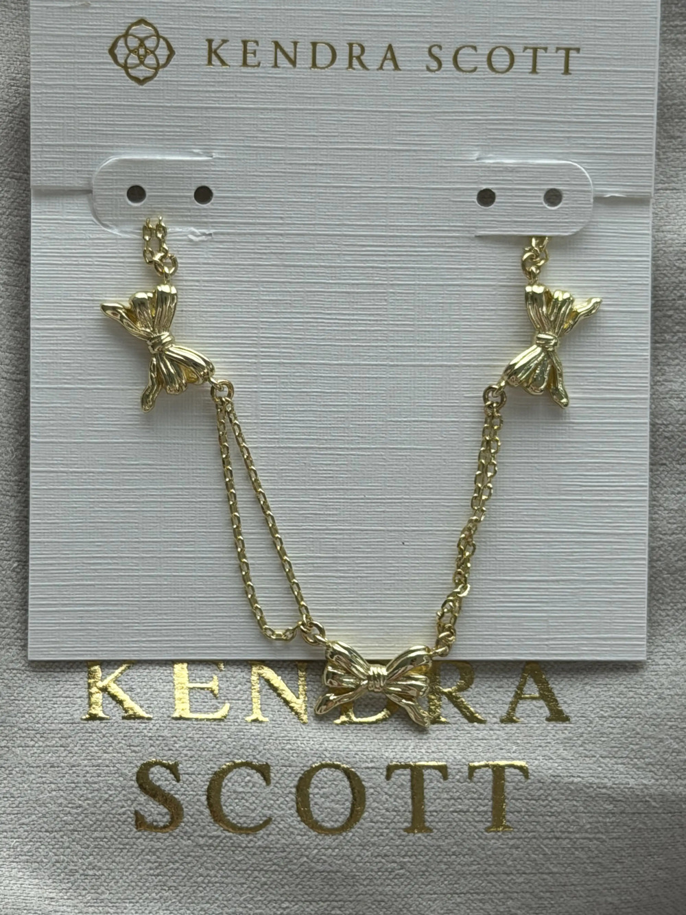 Kendra Scott gold bow necklace